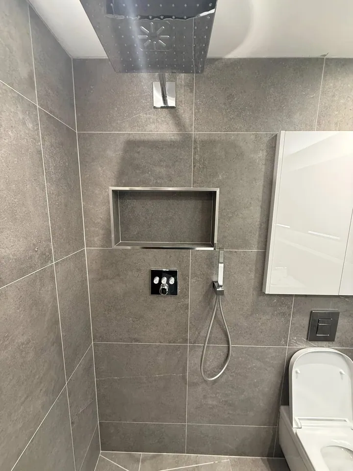 Shower mixer and recessed storage